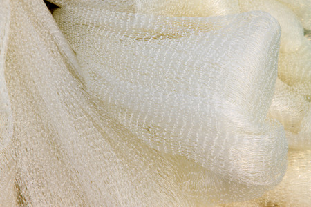 White nylon fishing nets, closeup of photo