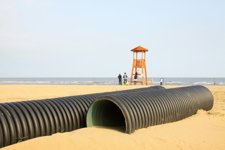 Black piping and coastal watchtowers, closeup of photoの写真素材
