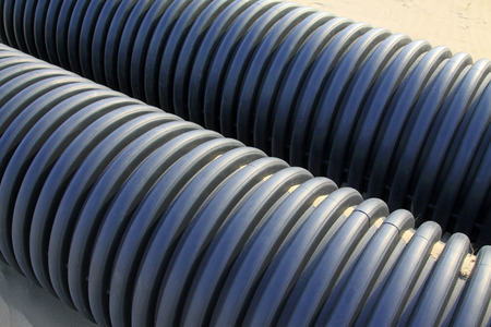 Black plastic pipe, closeup of photoの写真素材