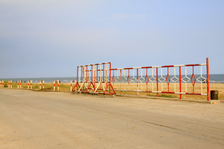 Metal railing on the side of the road, closeup of photoの写真素材