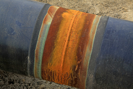 Black metal pipe, closeup of photoの写真素材