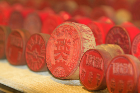 TANGSHAN CITY - NOVEMBER 18: all kinds of red rubber official seal in a museum, on november 18, 2014, Tangshan City, Hebei Province, Chinaのeditorial素材