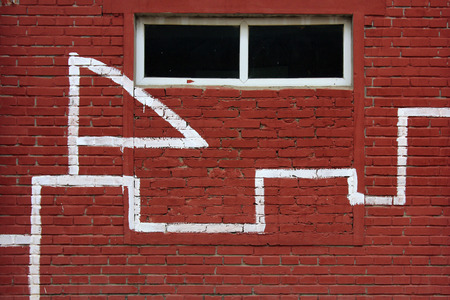 painting on the red house wall のeditorial素材