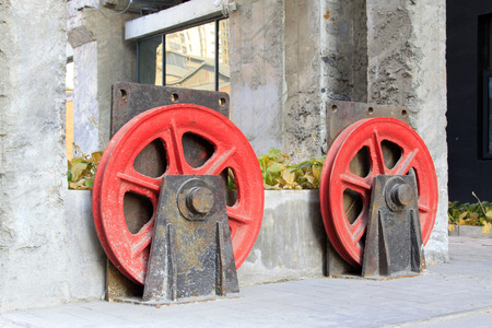 Concrete pouring construction with red machinery equipment, closeup of photoの写真素材
