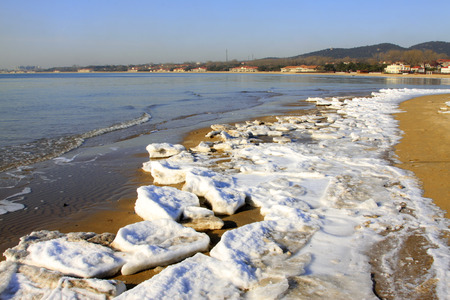 ice and snow natural landscape by the sea, closeup of photoの写真素材
