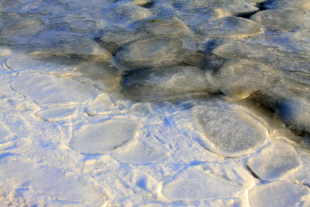 ice and snow natural landscape by the sea, closeup of photoの写真素材