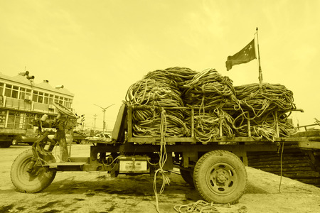 piles of coir ropes on a tricycle, in the ZuiDong pier, Luannan County, Hebei Province, Chinaのeditorial素材