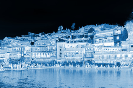 Phoenix County, April 15: House projecting over the water on April 15, 2012, Phoenix County, Hunan Province, Chinaのeditorial素材