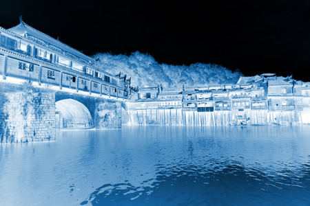 Phoenix County, April 15: House projecting over the water on April 15, 2012, Phoenix County, Hunan Province, Chinaのeditorial素材