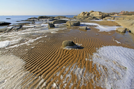 rock and ice in beach, closeup of photoの写真素材