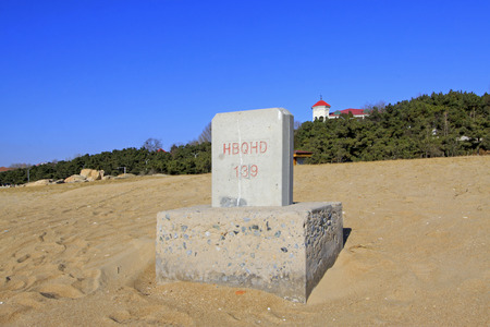 Stone tablets on the beach, closeup of photoのeditorial素材