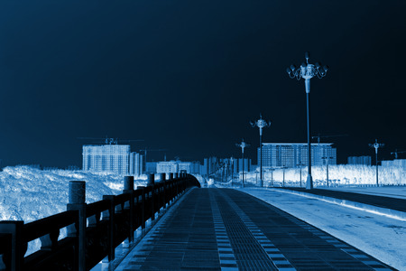 bridge and road lamp under the skyの写真素材