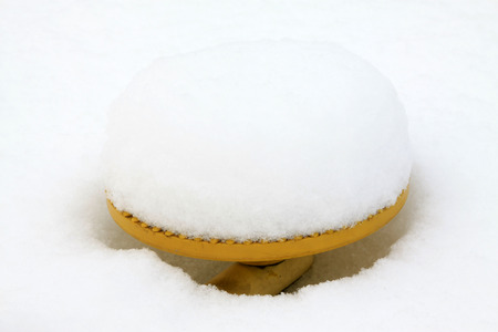 central yellow metal facilities in the snow, closeup of photoの写真素材