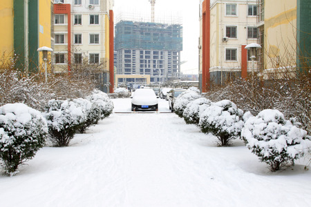 Residential buildings in the snow, closeup of photoのeditorial素材