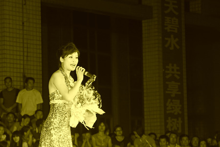 Tangshan City, July 28: Singing performance in the summer evening on July 28, 2012, Tangshan City, Hebei Province, China.のeditorial素材