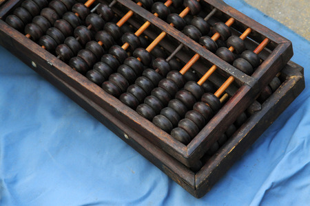 Chinese traditional calculator - abacus, closeup of photoの写真素材