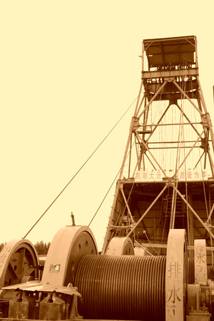 MaCheng July 12: Industrial stage winch for shaft sinking and drilling derrick in MaCheng iron mine on July 12, 2012, Luannan County, Hebei Province, Chinaのeditorial素材