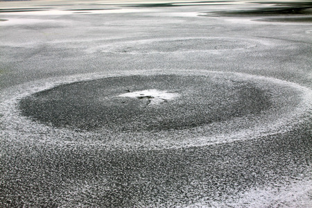 cracked ice on river in winter, Chinaの写真素材