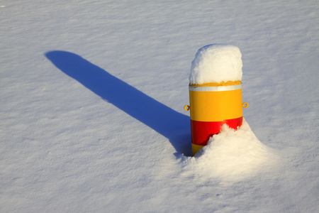 Metal barricades in the snow, closeup of photoの写真素材