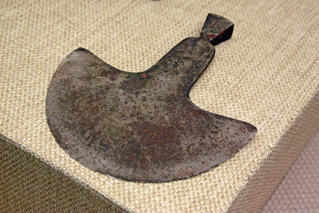 rusty iron oxide a shovel on linen cloth background , closeup of photoのeditorial素材