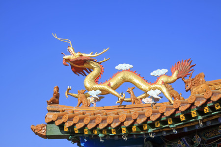dragon sculpture in a temple, closeup of photoの写真素材
