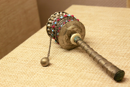 Tibetan Buddhism supplies - handheld prayer wheel, closeup of photoのeditorial素材