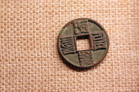 ancient Chinese copper coin, closeup of photoのeditorial素材