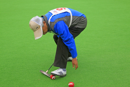 Luannan County - May 8: sportsman in Chinese gate ball match scene, on May 8, 2015, Luannan County,...