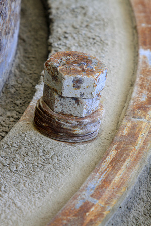 metal screw with oil sludge, closeup of photoの写真素材