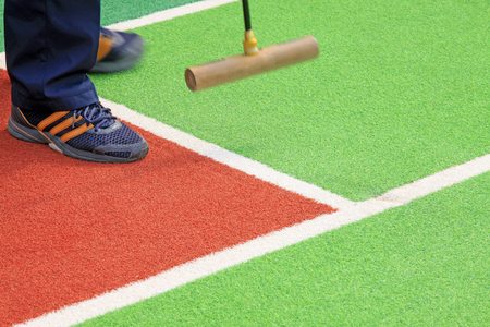 Chinese gate ball and athlete's legs, closeup of photoのeditorial素材
