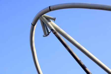 Arc steel tube landscape architecture in a construction siteの写真素材