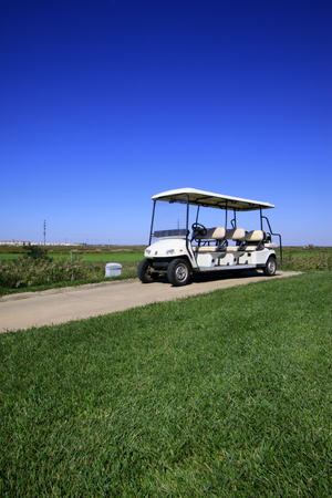 golf course landscape and battery cart, closeup of photoのeditorial素材