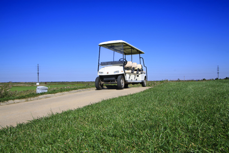 golf course landscape and battery cart, closeup of photoのeditorial素材
