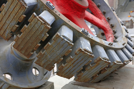 Big gear in a factory, closeup of photo