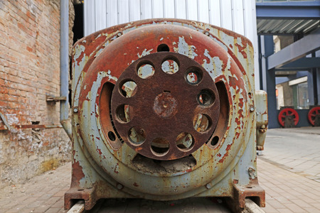 abandoned large mechanical equipment, closeup of photo