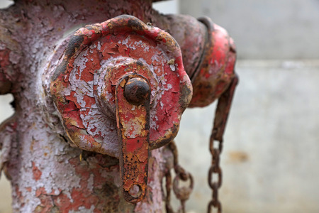 closeup of photo, old fire hydrant in a factoryの写真素材