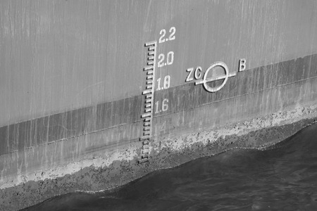 closeup of waterline marked on shipの写真素材