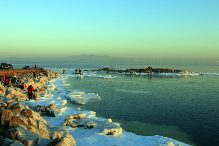 photographers shooting seaside scenery, beidaihe, China