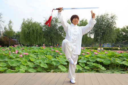 LUANNAN COUNTY - July 16: people practicing taichi on July 16, 2016, Luannan county, Hebei Province,...