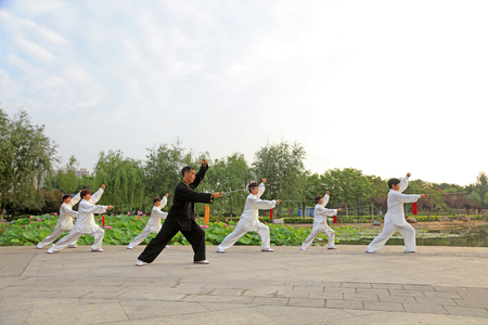 LUANNAN COUNTY - July 16: people practicing taichi on July 16, 2016, Luannan county, Hebei Province, Chinaのeditorial素材