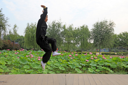 LUANNAN COUNTY - July 16: people practicing taichi on July 16, 2016, Luannan county, Hebei Province, Chinaのeditorial素材