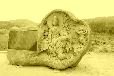 LUAN COUNTY - NOVEMBER 23: Stone carving bodhisattva in Hengshan Dajue Temple, on november 23, 2014, Luan County, Hebei Province, Chinaのeditorial素材
