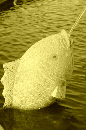 Fish sculpture handicraft, closeup of photoの写真素材