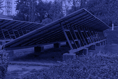solar panels stents in a garden, closeup of photo