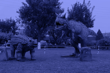BEIJING - OCTOBER 23: Dinosaur model in a park, on october 23, 2014, Beijing, China.のeditorial素材