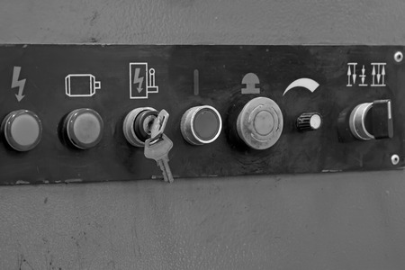 Nc machine tool switches and buttons in a production workshopの写真素材