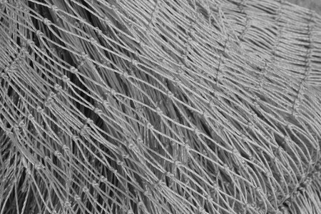 Nylon fishing nets in a market, closeup of photo