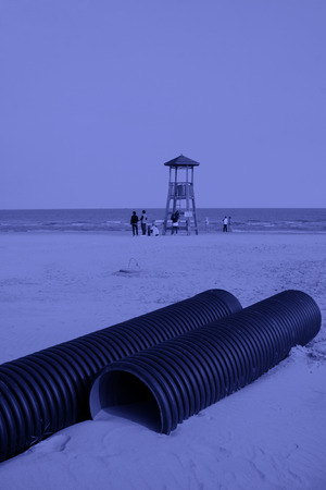 Black piping and coastal watchtowers, closeup of photoのeditorial素材
