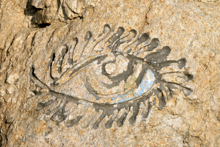 eye pattern carved on the rockの写真素材