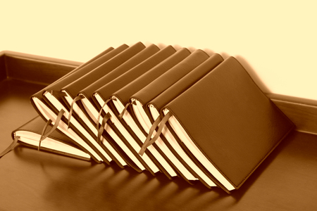 black notebook on the table, closeup of pictureの写真素材